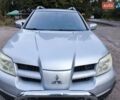 Мицубиси Аутлендер 2006 в Чернигове на Automoto.ua Серый Мицубиси Аутлендер, объемом двигателя 2.4 л и пробегом 147 тыс. км за 6900 $, фото 2 на Automoto.ua