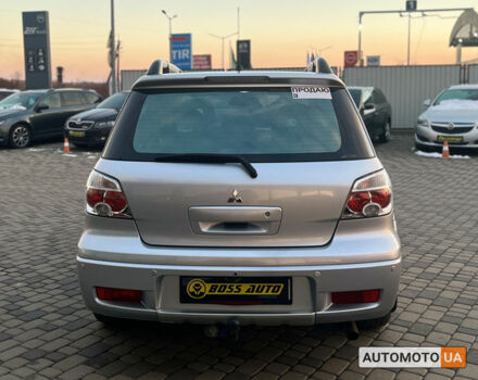 Серый Мицубиси Аутлендер, объемом двигателя 2.4 л и пробегом 231 тыс. км за 8100 $, фото 5 на Automoto.ua
