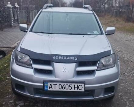 Серый Мицубиси Аутлендер, объемом двигателя 2.4 л и пробегом 261 тыс. км за 5700 $, фото 2 на Automoto.ua