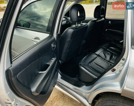 Серый Мицубиси Аутлендер, объемом двигателя 2.4 л и пробегом 264 тыс. км за 6300 $, фото 11 на Automoto.ua