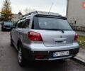 Сірий Міцубісі Аутлендер, об'ємом двигуна 2 л та пробігом 312 тис. км за 8300 $, фото 4 на Automoto.ua
