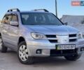 Сірий Міцубісі Аутлендер, об'ємом двигуна 2 л та пробігом 170 тис. км за 6300 $, фото 1 на Automoto.ua