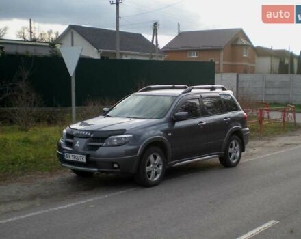 Серый Мицубиси Аутлендер, объемом двигателя 2.4 л и пробегом 235 тыс. км за 6500 $, фото 3 на Automoto.ua