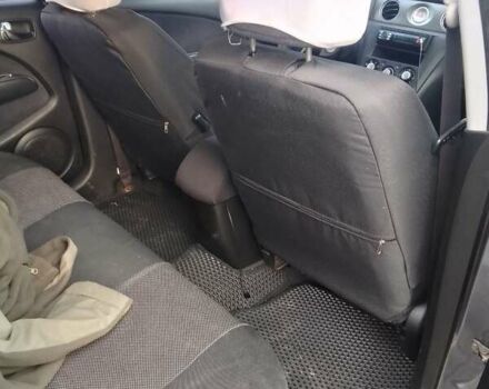 Серый Мицубиси Аутлендер, объемом двигателя 2 л и пробегом 154 тыс. км за 6500 $, фото 8 на Automoto.ua