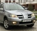 Сірий Міцубісі Аутлендер, об'ємом двигуна 2.4 л та пробігом 98 тис. км за 7199 $, фото 19 на Automoto.ua