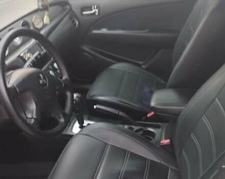 Серый Мицубиси Аутлендер, объемом двигателя 2.4 л и пробегом 261 тыс. км за 5700 $, фото 39 на Automoto.ua