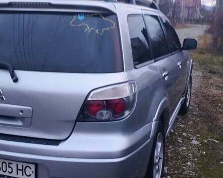 Серый Мицубиси Аутлендер, объемом двигателя 2.4 л и пробегом 261 тыс. км за 5700 $, фото 29 на Automoto.ua