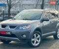 Серый Мицубиси Аутлендер, объемом двигателя 3 л и пробегом 159 тыс. км за 7700 $, фото 1 на Automoto.ua