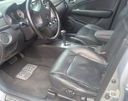 Серый Мицубиси Аутлендер, объемом двигателя 2.4 л и пробегом 240 тыс. км за 7300 $, фото 5 на Automoto.ua