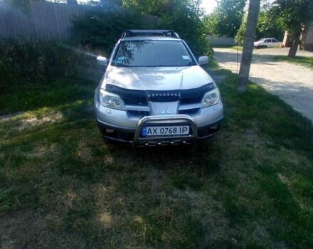 Сірий Міцубісі Аутлендер, об'ємом двигуна 2.38 л та пробігом 226 тис. км за 10000 $, фото 6 на Automoto.ua