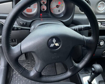 Серый Мицубиси Аутлендер, объемом двигателя 2.38 л и пробегом 180 тыс. км за 6000 $, фото 29 на Automoto.ua