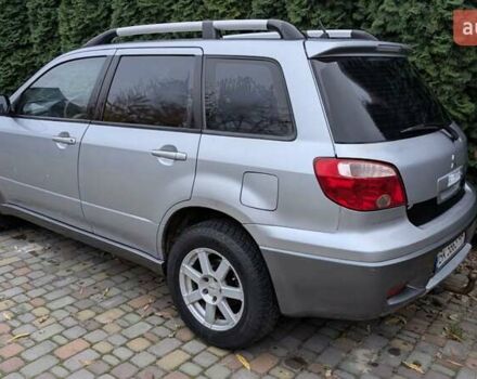 Серый Мицубиси Аутлендер, объемом двигателя 2 л и пробегом 226 тыс. км за 5500 $, фото 6 на Automoto.ua