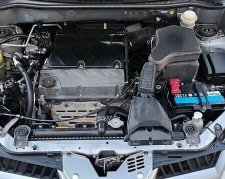 Серый Мицубиси Аутлендер, объемом двигателя 2.38 л и пробегом 228 тыс. км за 7900 $, фото 9 на Automoto.ua