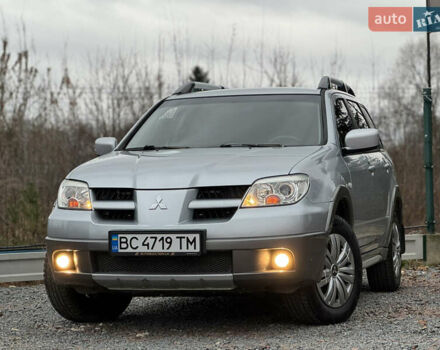 Серый Мицубиси Аутлендер, объемом двигателя 2.38 л и пробегом 204 тыс. км за 6990 $, фото 44 на Automoto.ua