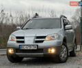 Серый Мицубиси Аутлендер, объемом двигателя 2.38 л и пробегом 204 тыс. км за 6990 $, фото 44 на Automoto.ua