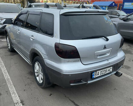 Серый Мицубиси Аутлендер, объемом двигателя 2.4 л и пробегом 307 тыс. км за 4000 $, фото 4 на Automoto.ua