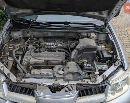 Серый Мицубиси Аутлендер, объемом двигателя 2 л и пробегом 226 тыс. км за 5500 $, фото 5 на Automoto.ua