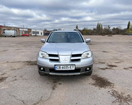 Серый Мицубиси Аутлендер, объемом двигателя 2.4 л и пробегом 264 тыс. км за 6300 $, фото 1 на Automoto.ua