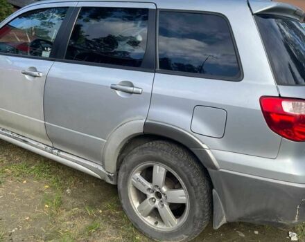 Серый Мицубиси Аутлендер, объемом двигателя 2.4 л и пробегом 127 тыс. км за 4400 $, фото 10 на Automoto.ua