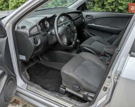 Серый Мицубиси Аутлендер, объемом двигателя 2 л и пробегом 226 тыс. км за 5500 $, фото 8 на Automoto.ua