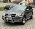 Серый Мицубиси Аутлендер, объемом двигателя 2.4 л и пробегом 400 тыс. км за 5300 $, фото 2 на Automoto.ua