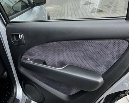 Серый Мицубиси Аутлендер, объемом двигателя 2.38 л и пробегом 180 тыс. км за 6000 $, фото 20 на Automoto.ua