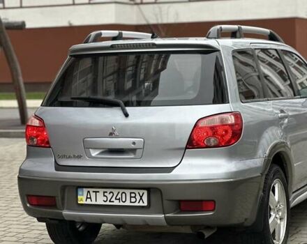 Сірий Міцубісі Аутлендер, об'ємом двигуна 2.4 л та пробігом 98 тис. км за 7199 $, фото 35 на Automoto.ua