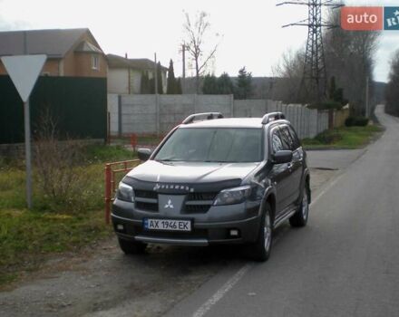 Серый Мицубиси Аутлендер, объемом двигателя 2.4 л и пробегом 235 тыс. км за 6500 $, фото 2 на Automoto.ua