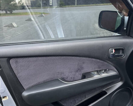 Серый Мицубиси Аутлендер, объемом двигателя 2.38 л и пробегом 180 тыс. км за 6000 $, фото 18 на Automoto.ua