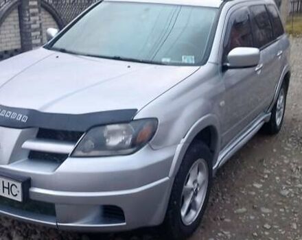 Серый Мицубиси Аутлендер, объемом двигателя 2.4 л и пробегом 261 тыс. км за 5700 $, фото 11 на Automoto.ua