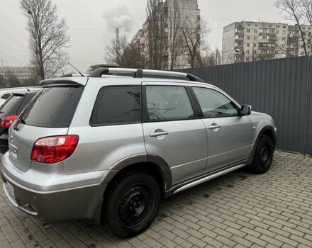 Серый Мицубиси Аутлендер, объемом двигателя 2.4 л и пробегом 179 тыс. км за 7000 $, фото 3 на Automoto.ua
