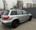 Серый Мицубиси Аутлендер, объемом двигателя 2.4 л и пробегом 179 тыс. км за 7000 $, фото 3 на Automoto.ua