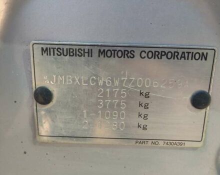 Серый Мицубиси Аутлендер, объемом двигателя 3 л и пробегом 193 тыс. км за 9200 $, фото 39 на Automoto.ua