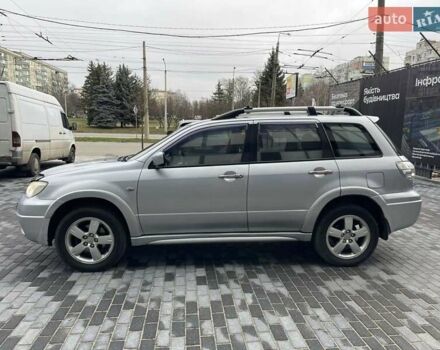 Серый Мицубиси Аутлендер, объемом двигателя 2.38 л и пробегом 280 тыс. км за 5800 $, фото 4 на Automoto.ua