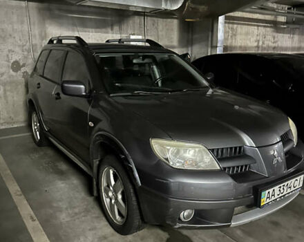 Серый Мицубиси Аутлендер, объемом двигателя 2 л и пробегом 200 тыс. км за 5900 $, фото 2 на Automoto.ua