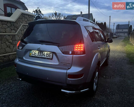 Серый Мицубиси Аутлендер, объемом двигателя 2.4 л и пробегом 236 тыс. км за 7600 $, фото 54 на Automoto.ua