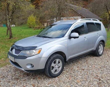 Серый Мицубиси Аутлендер, объемом двигателя 2 л и пробегом 320 тыс. км за 7500 $, фото 4 на Automoto.ua