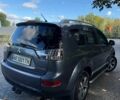 Серый Мицубиси Аутлендер, объемом двигателя 2 л и пробегом 280 тыс. км за 7700 $, фото 4 на Automoto.ua