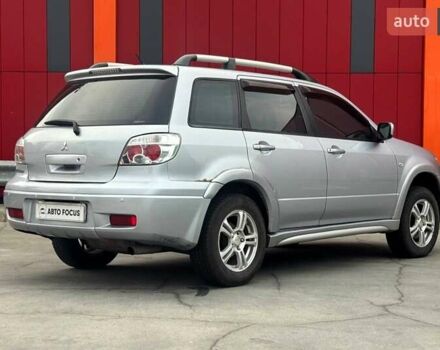 Серый Мицубиси Аутлендер, объемом двигателя 2.38 л и пробегом 245 тыс. км за 5590 $, фото 7 на Automoto.ua
