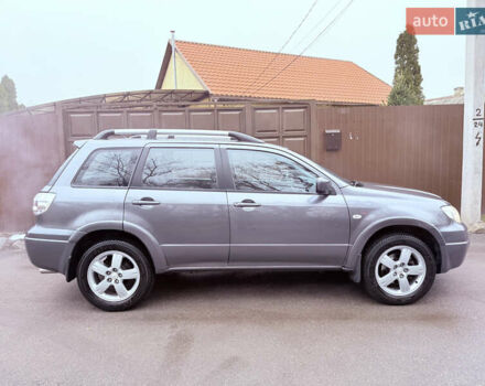 Серый Мицубиси Аутлендер, объемом двигателя 2.4 л и пробегом 240 тыс. км за 6900 $, фото 54 на Automoto.ua