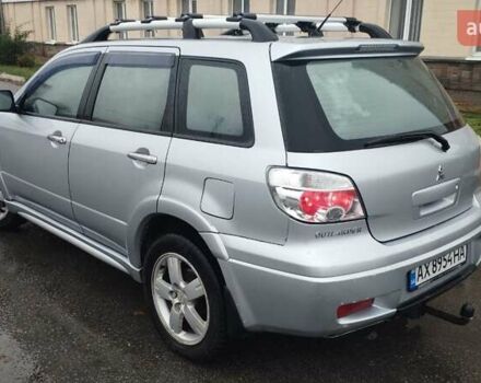 Серый Мицубиси Аутлендер, объемом двигателя 2.38 л и пробегом 204 тыс. км за 6100 $, фото 2 на Automoto.ua