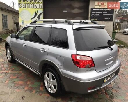 Сірий Міцубісі Аутлендер, об'ємом двигуна 2.4 л та пробігом 167 тис. км за 6400 $, фото 4 на Automoto.ua