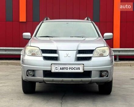 Сірий Міцубісі Аутлендер, об'ємом двигуна 2.38 л та пробігом 245 тис. км за 5990 $, фото 2 на Automoto.ua