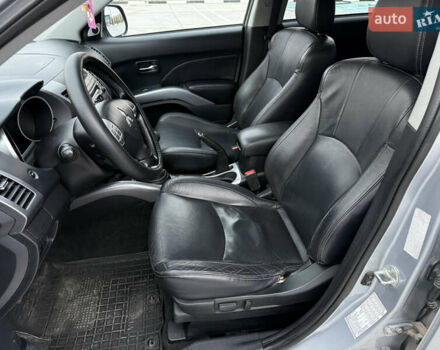 Серый Мицубиси Аутлендер, объемом двигателя 2 л и пробегом 299 тыс. км за 7750 $, фото 25 на Automoto.ua