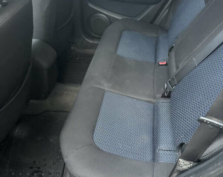 Серый Мицубиси Аутлендер, объемом двигателя 2 л и пробегом 200 тыс. км за 5900 $, фото 4 на Automoto.ua