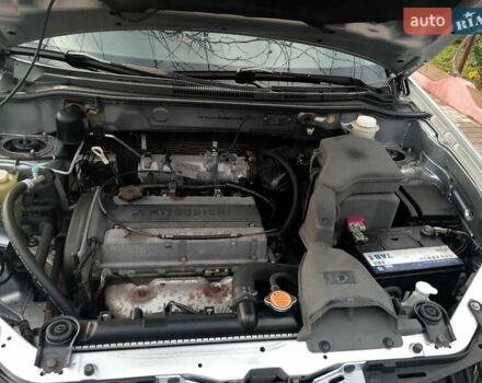 Сірий Міцубісі Аутлендер, об'ємом двигуна 2 л та пробігом 268 тис. км за 7500 $, фото 5 на Automoto.ua