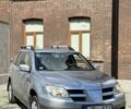 Сірий Міцубісі Аутлендер, об'ємом двигуна 2 л та пробігом 250 тис. км за 3500 $, фото 1 на Automoto.ua