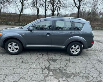 Серый Мицубиси Аутлендер, объемом двигателя 2 л и пробегом 258 тыс. км за 5000 $, фото 1 на Automoto.ua