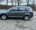 Серый Мицубиси Аутлендер, объемом двигателя 2 л и пробегом 258 тыс. км за 5000 $, фото 1 на Automoto.ua