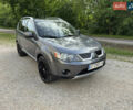 Серый Мицубиси Аутлендер, объемом двигателя 1.97 л и пробегом 260 тыс. км за 10900 $, фото 16 на Automoto.ua
